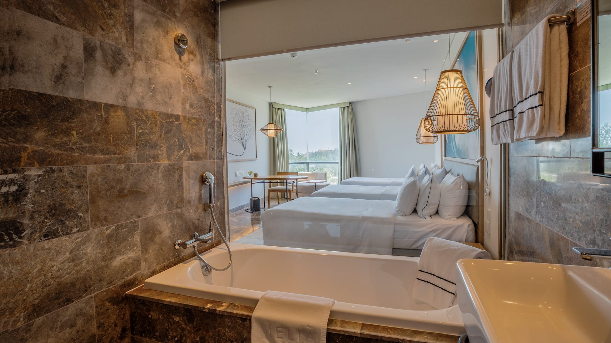 a bathroom with a bathtub and a sink