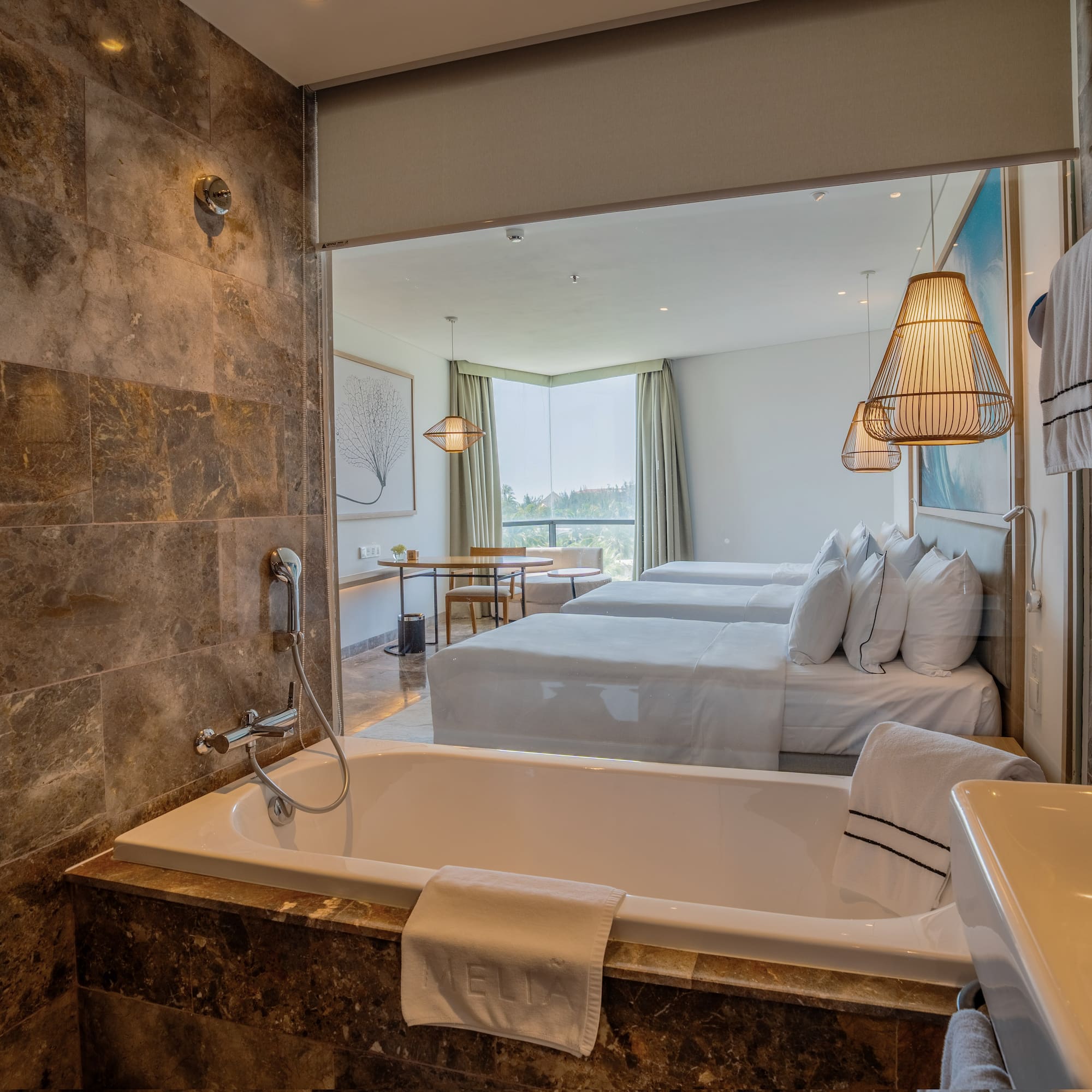 a bathroom with a bathtub and a sink