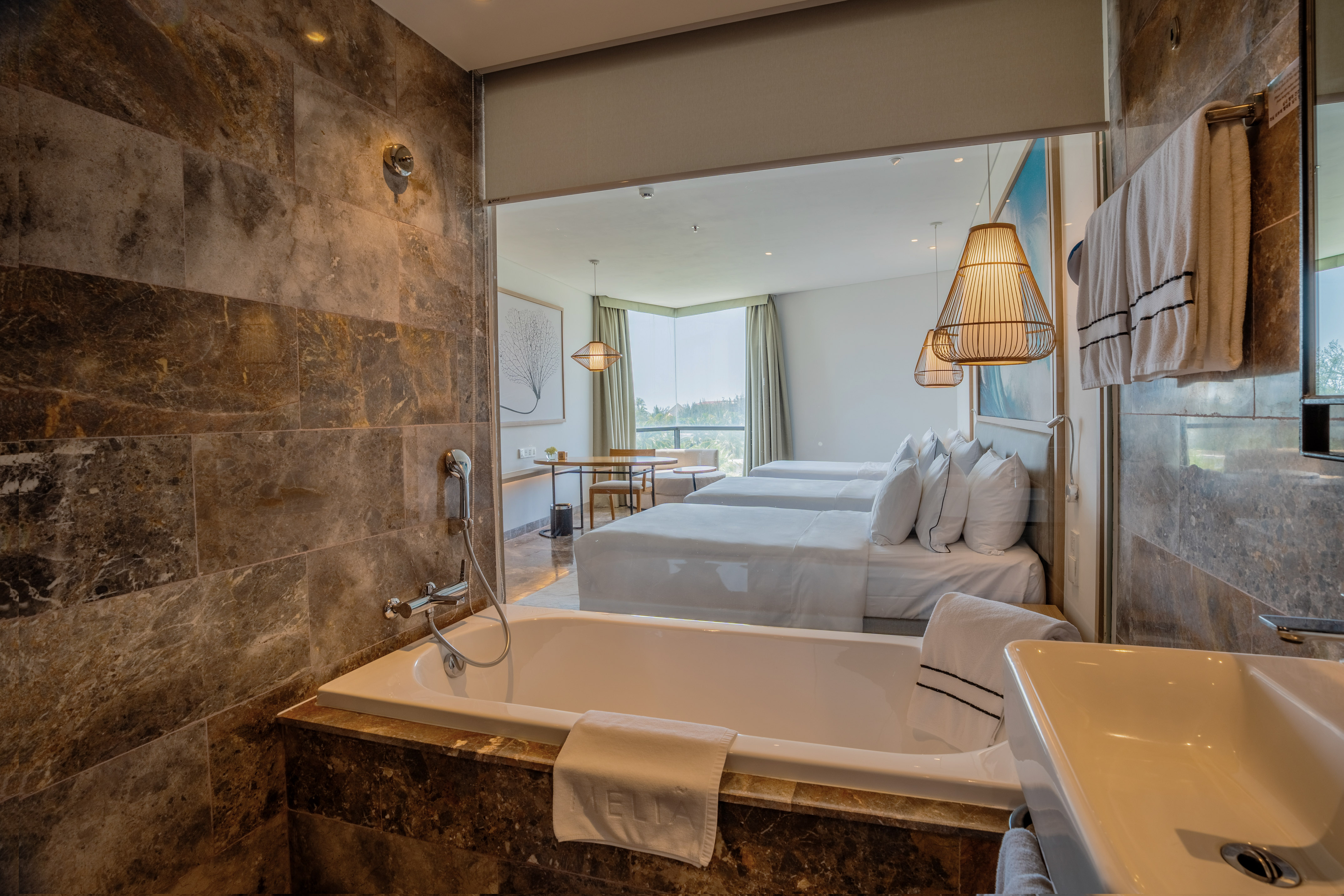 a bathroom with a bathtub and a sink