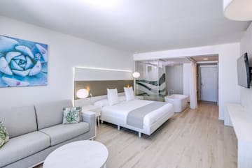 a room with a bed and a tub