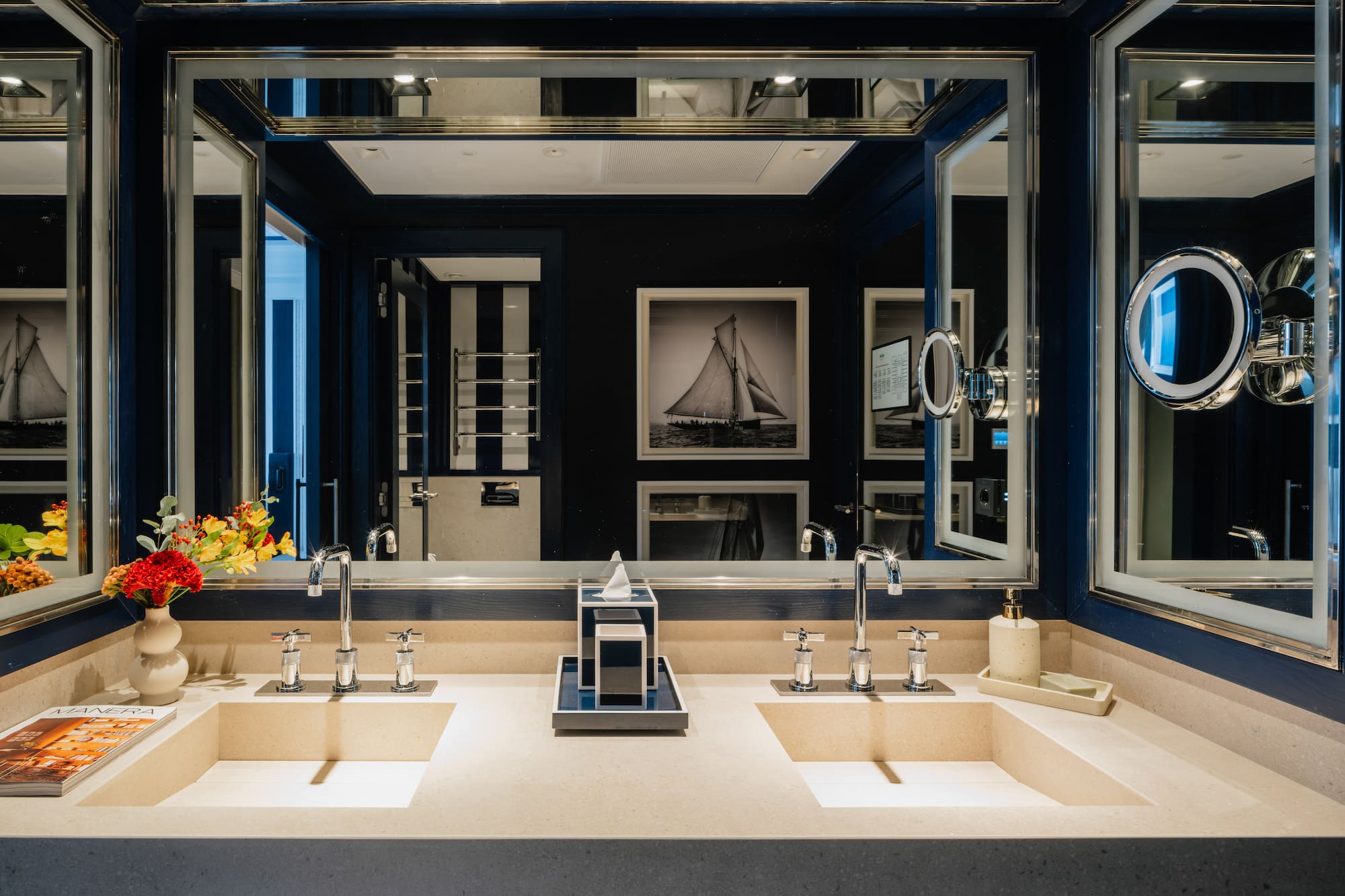 a bathroom with sinks and mirrors