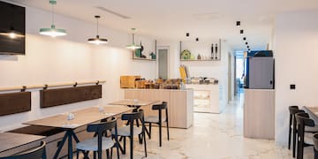 a room with a table and chairs