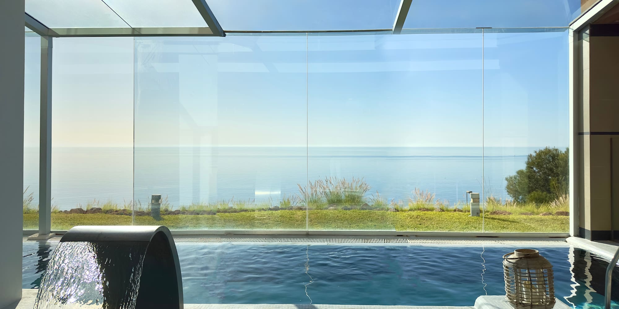 a pool with a view of the ocean