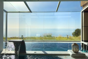 a pool with a view of the ocean