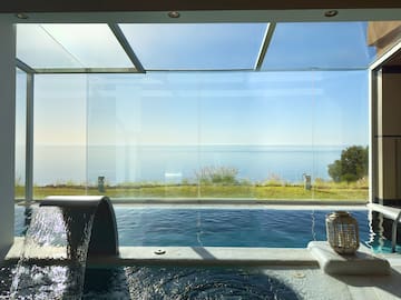 a pool with a view of the ocean
