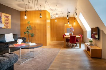 a room with a table and chairs