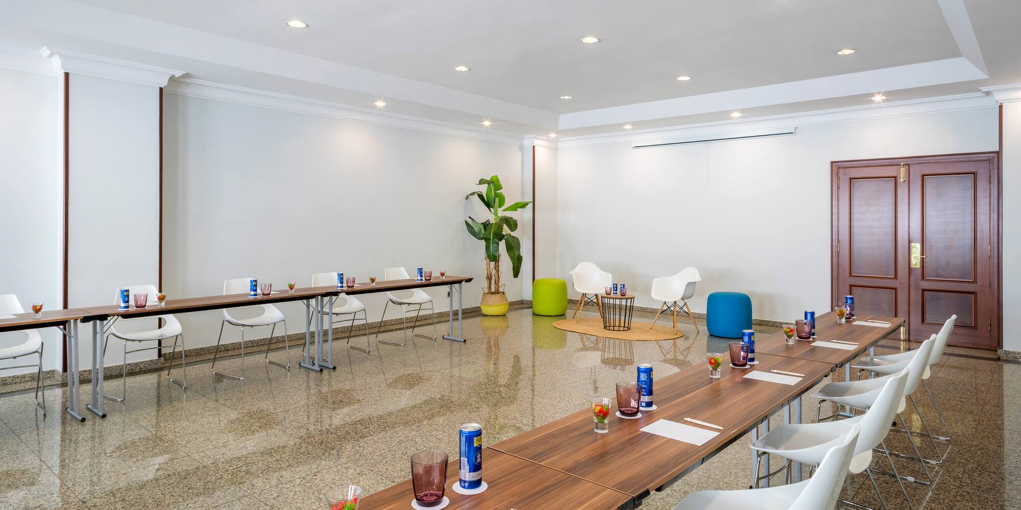 a room with tables and chairs