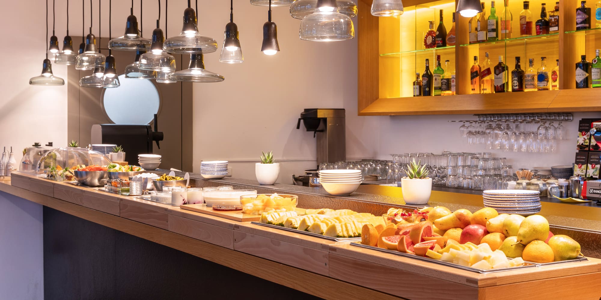 a buffet with fruit on a table