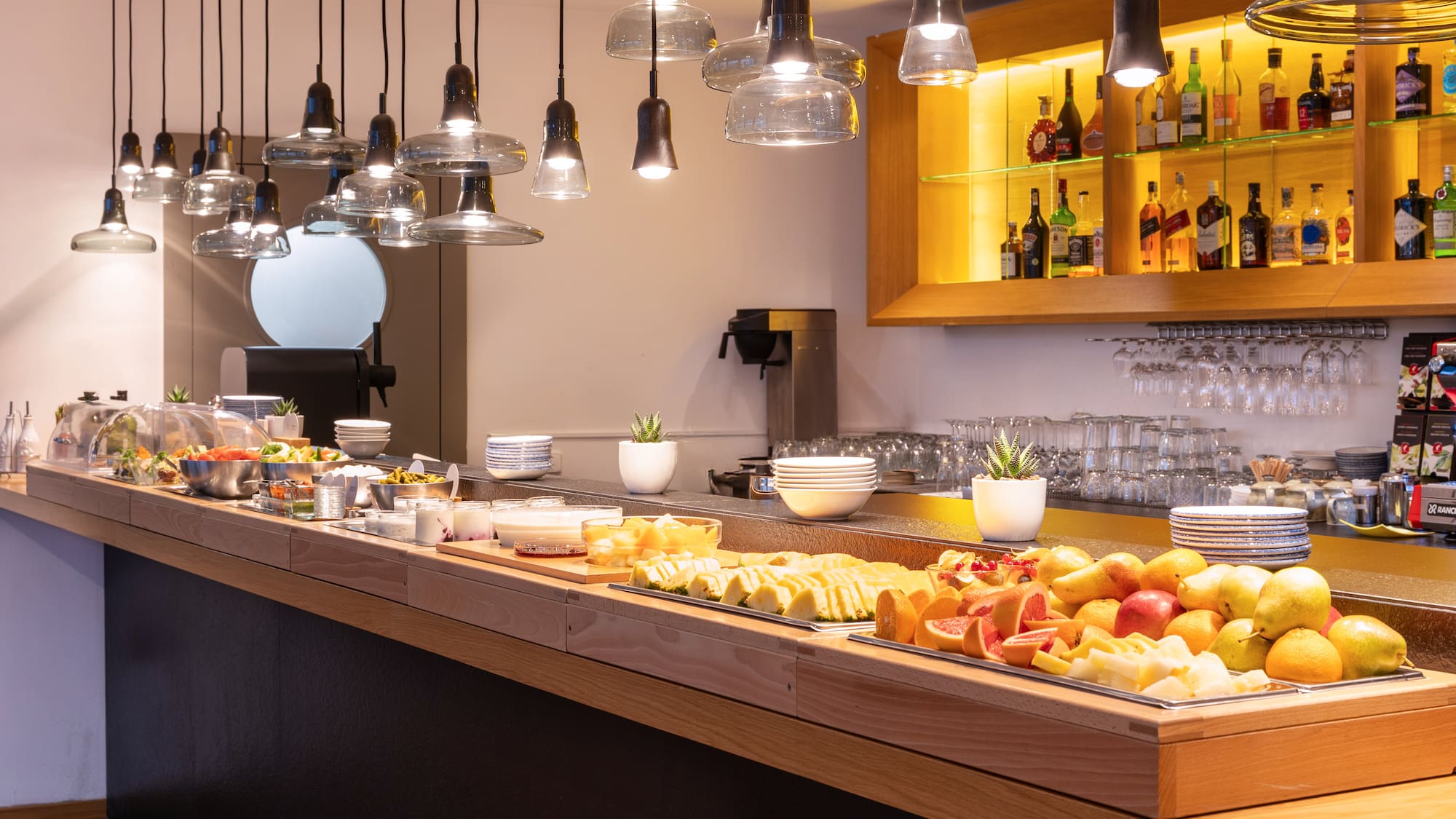 a buffet with fruit on a table