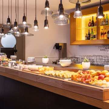 a buffet with fruit on a table
