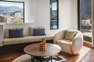 a living room with a couch and a coffee table
