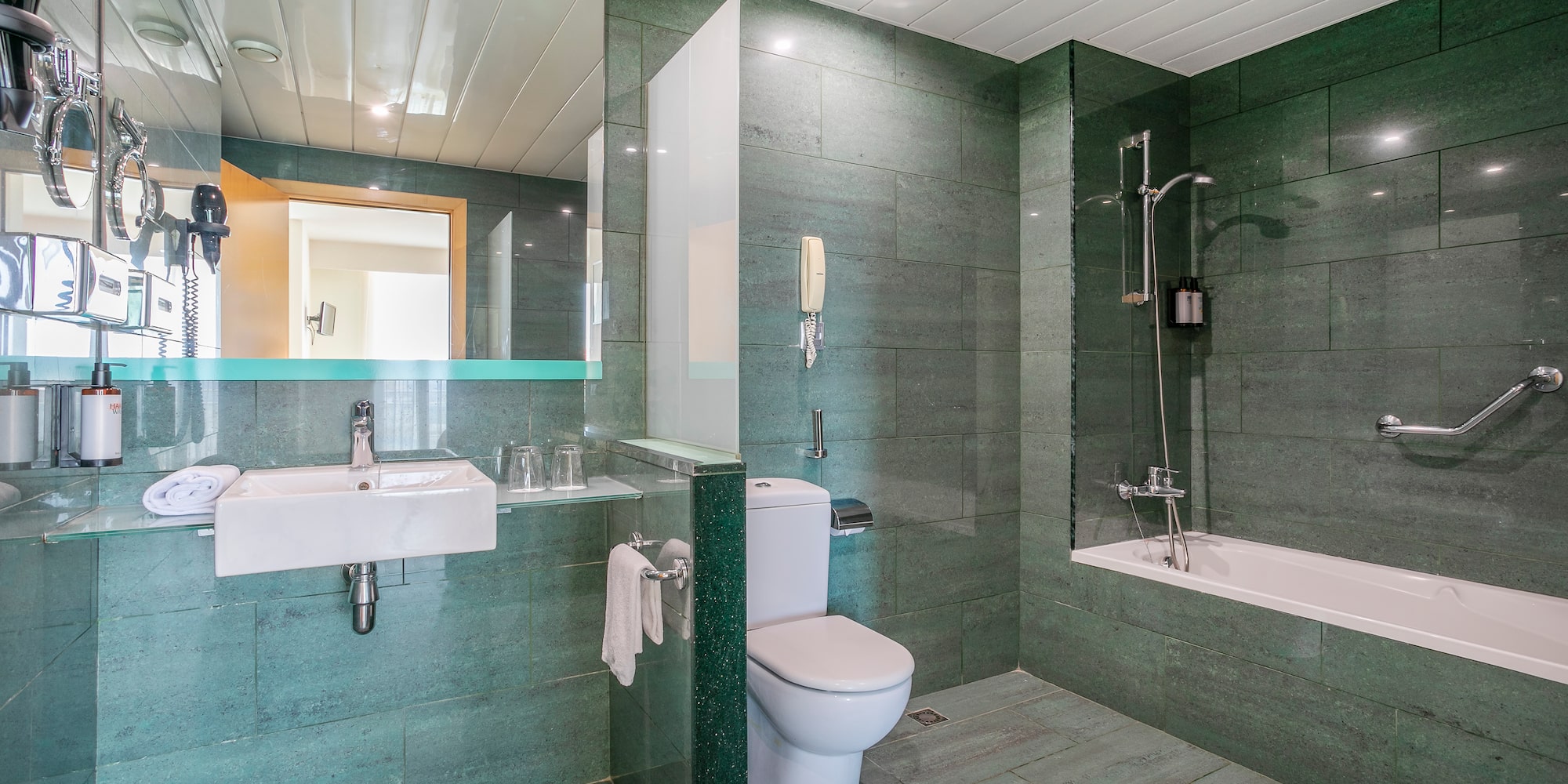 a bathroom with a sink and toilet