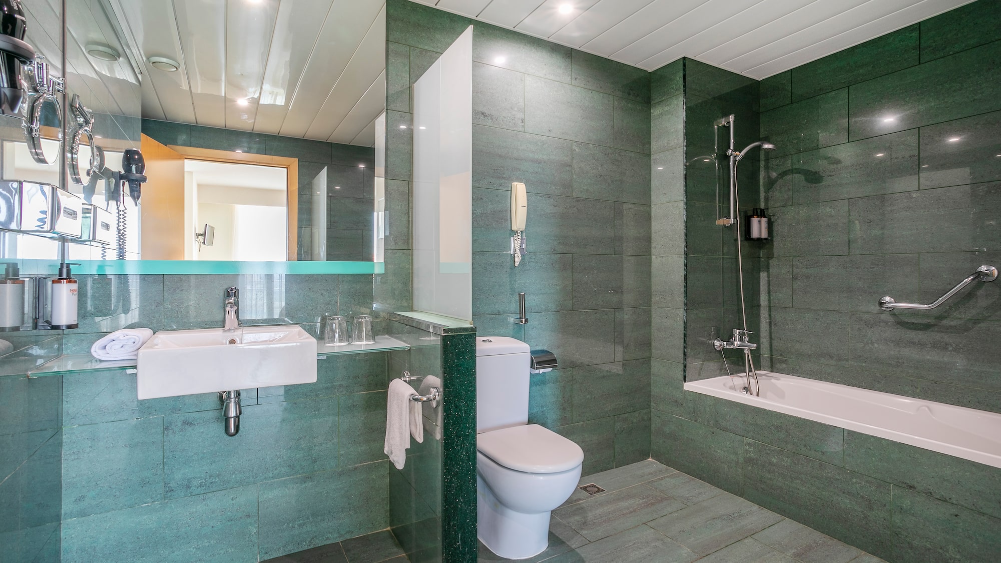 a bathroom with a sink and toilet