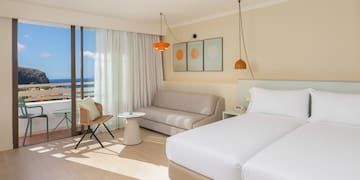 a room with a bed and a couch