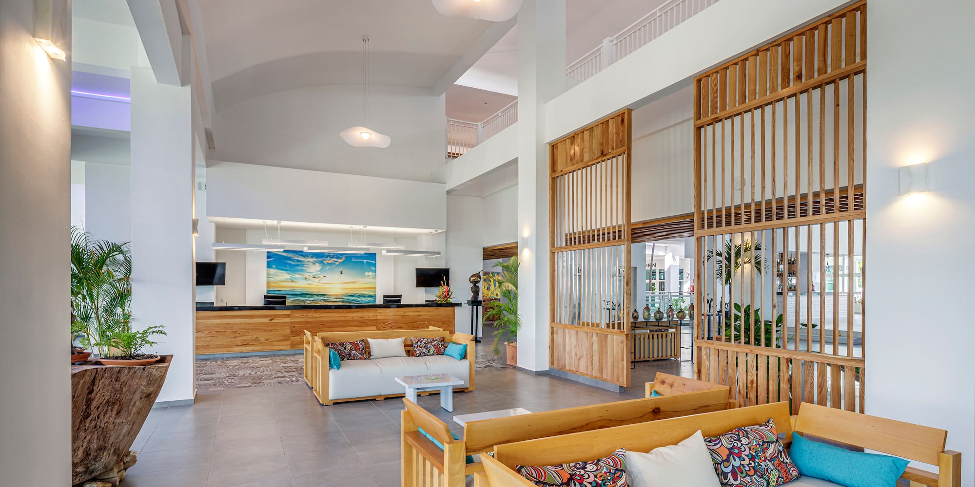 a lobby with a couch and a table