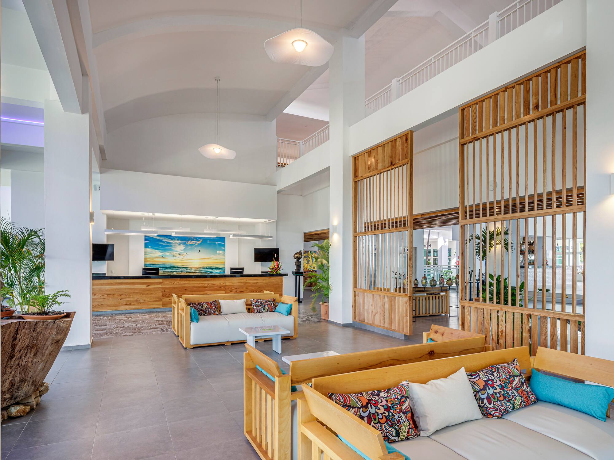 a lobby with a couch and a table