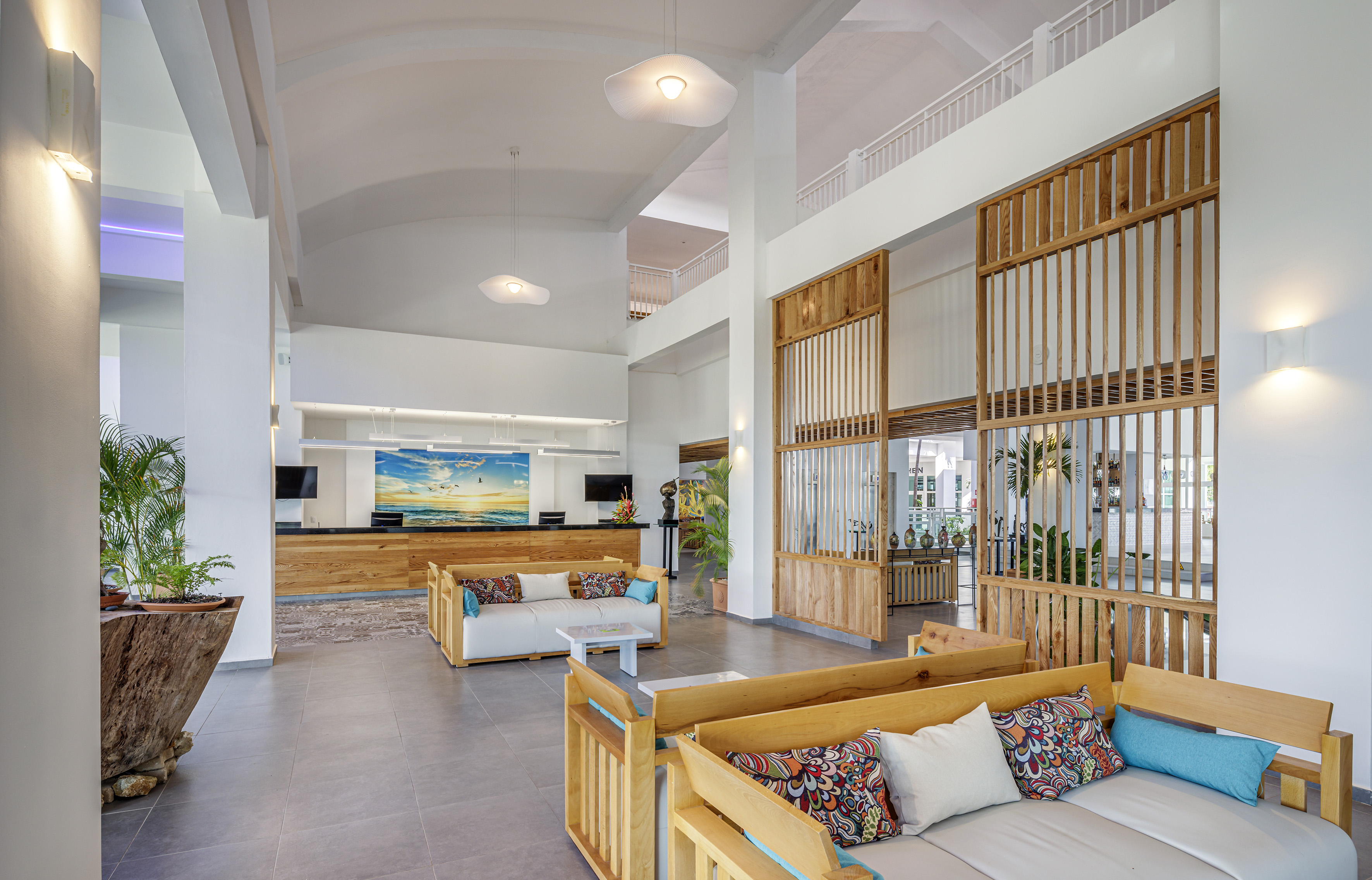 a lobby with a couch and a table