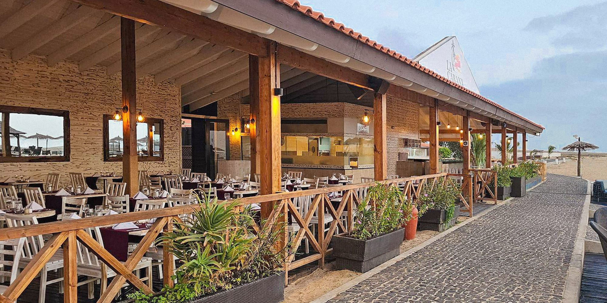 a restaurant with tables and chairs