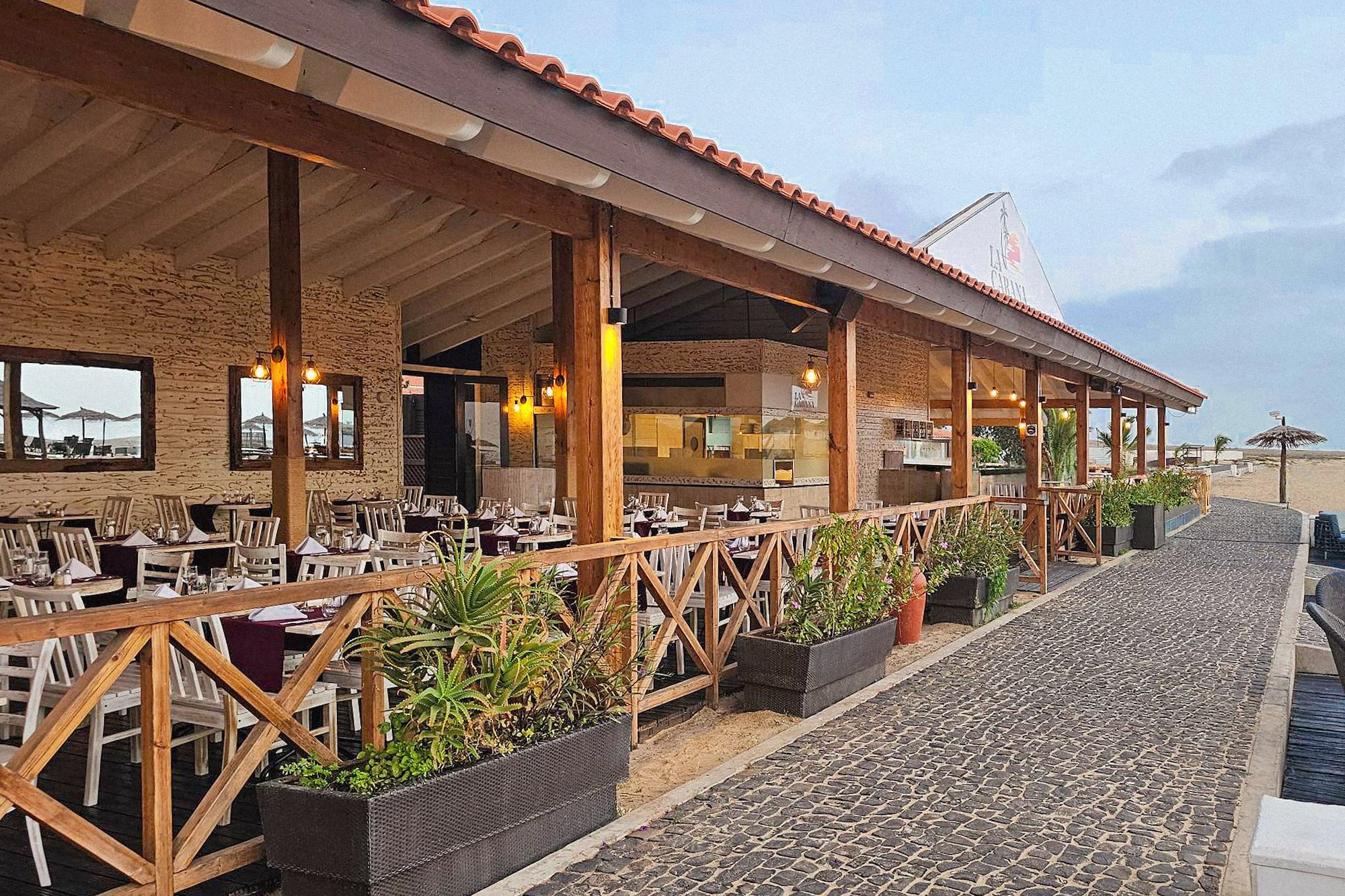a restaurant with tables and chairs