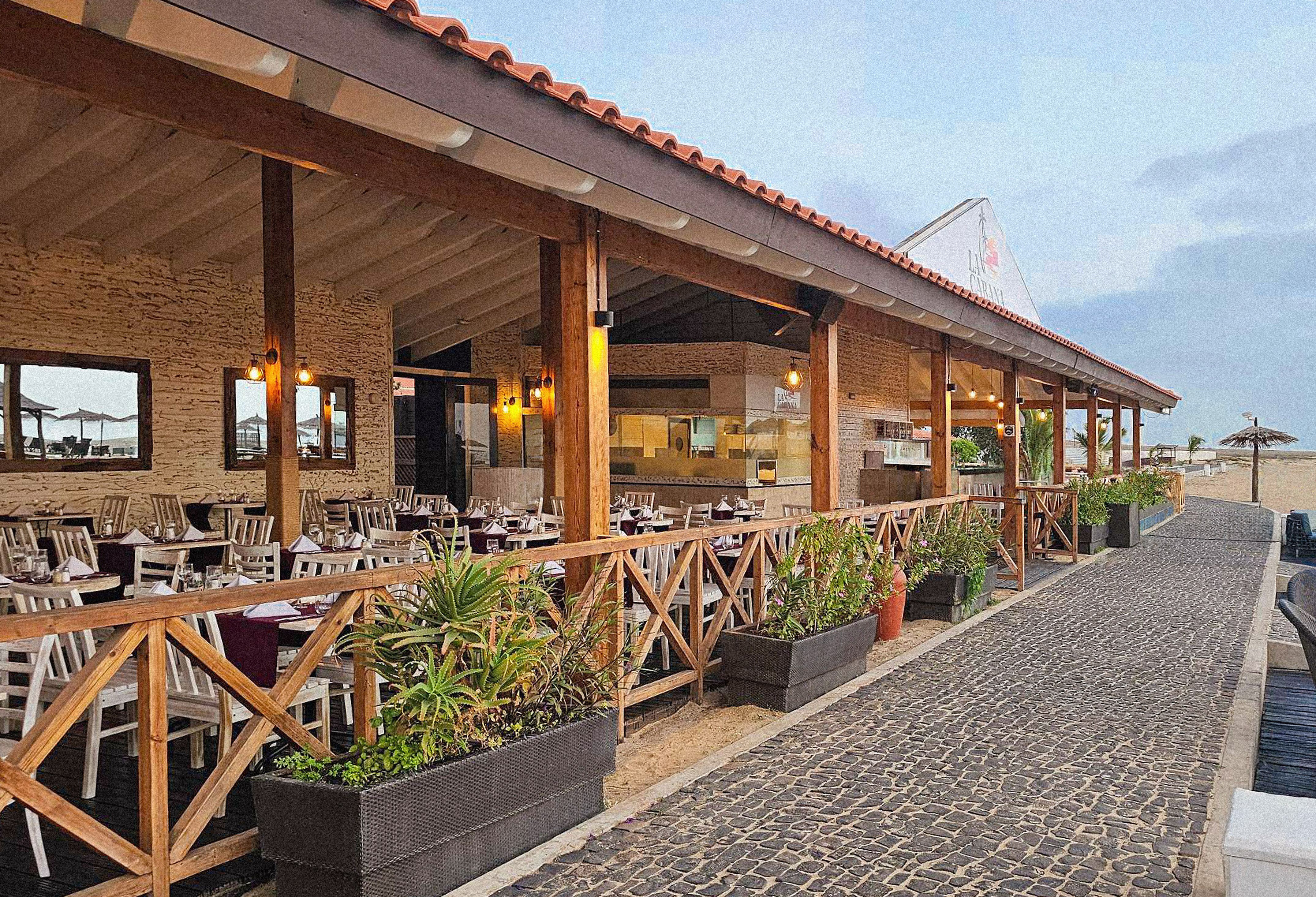 a restaurant with tables and chairs