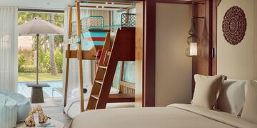 a room with a bed and a slide