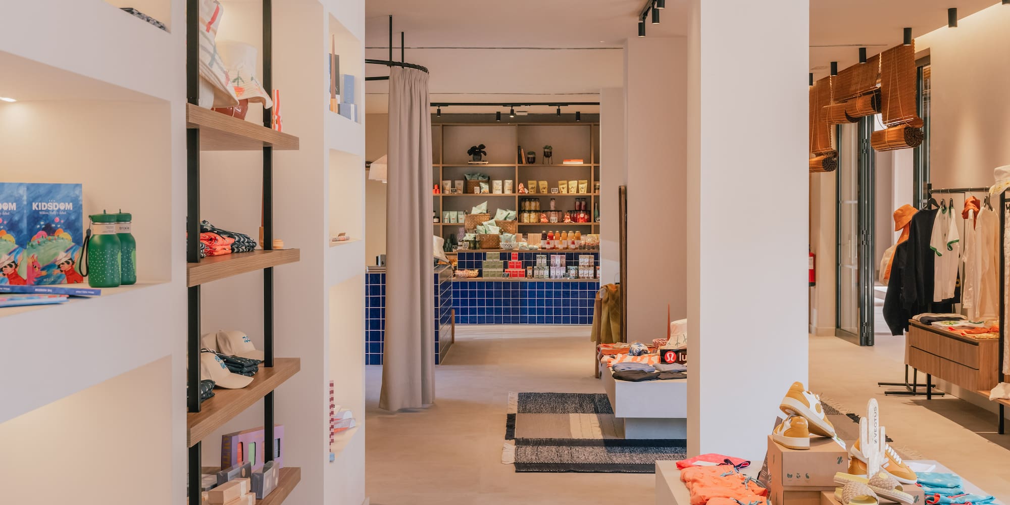 a store with shelves and shelves of clothing