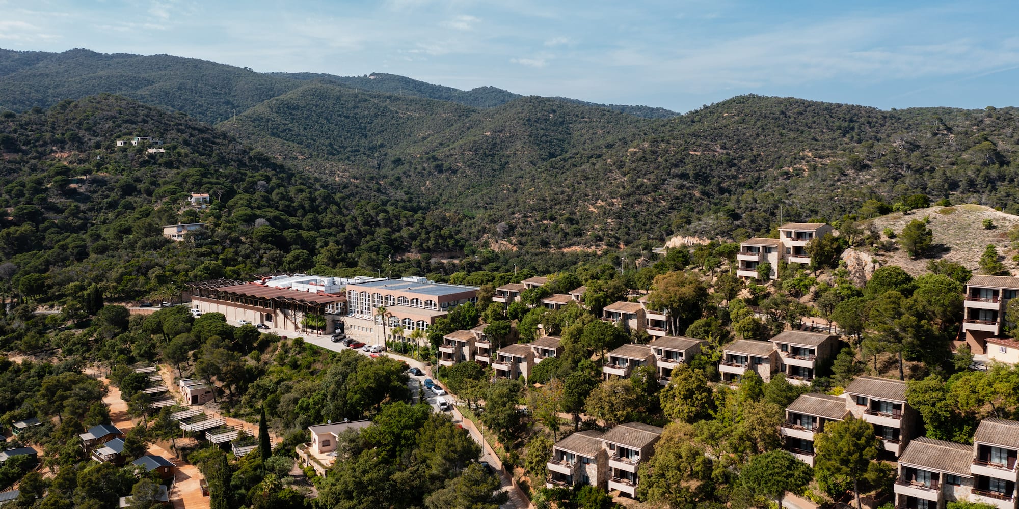 a group of buildings on a hill