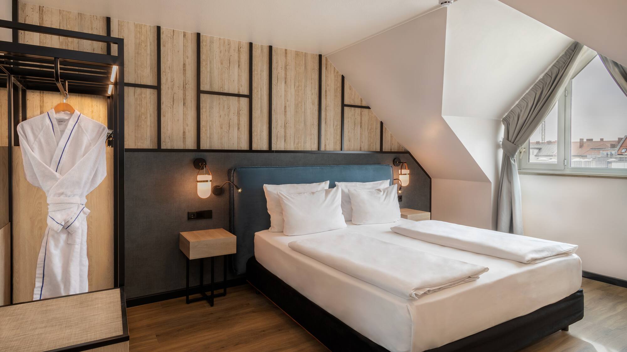 a bedroom with a bed and a window