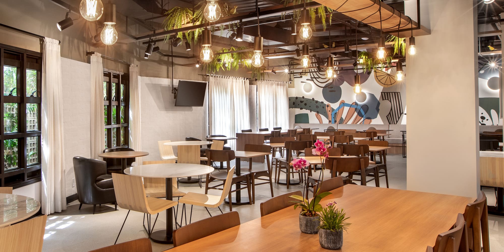 a room with tables and chairs