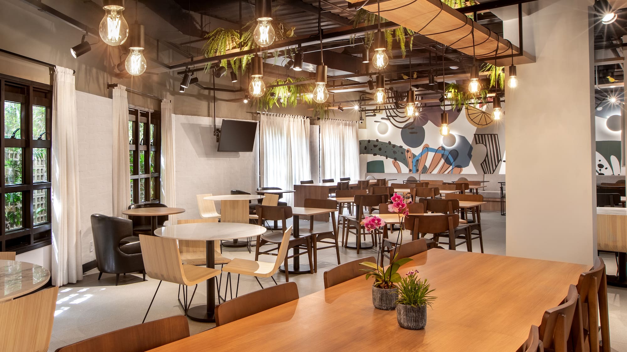 a room with tables and chairs