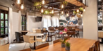 a room with tables and chairs