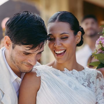 a man and woman smiling
