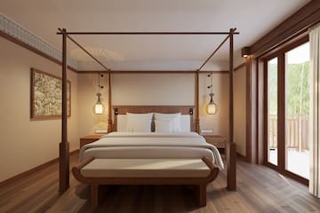 a bed with a four poster bed