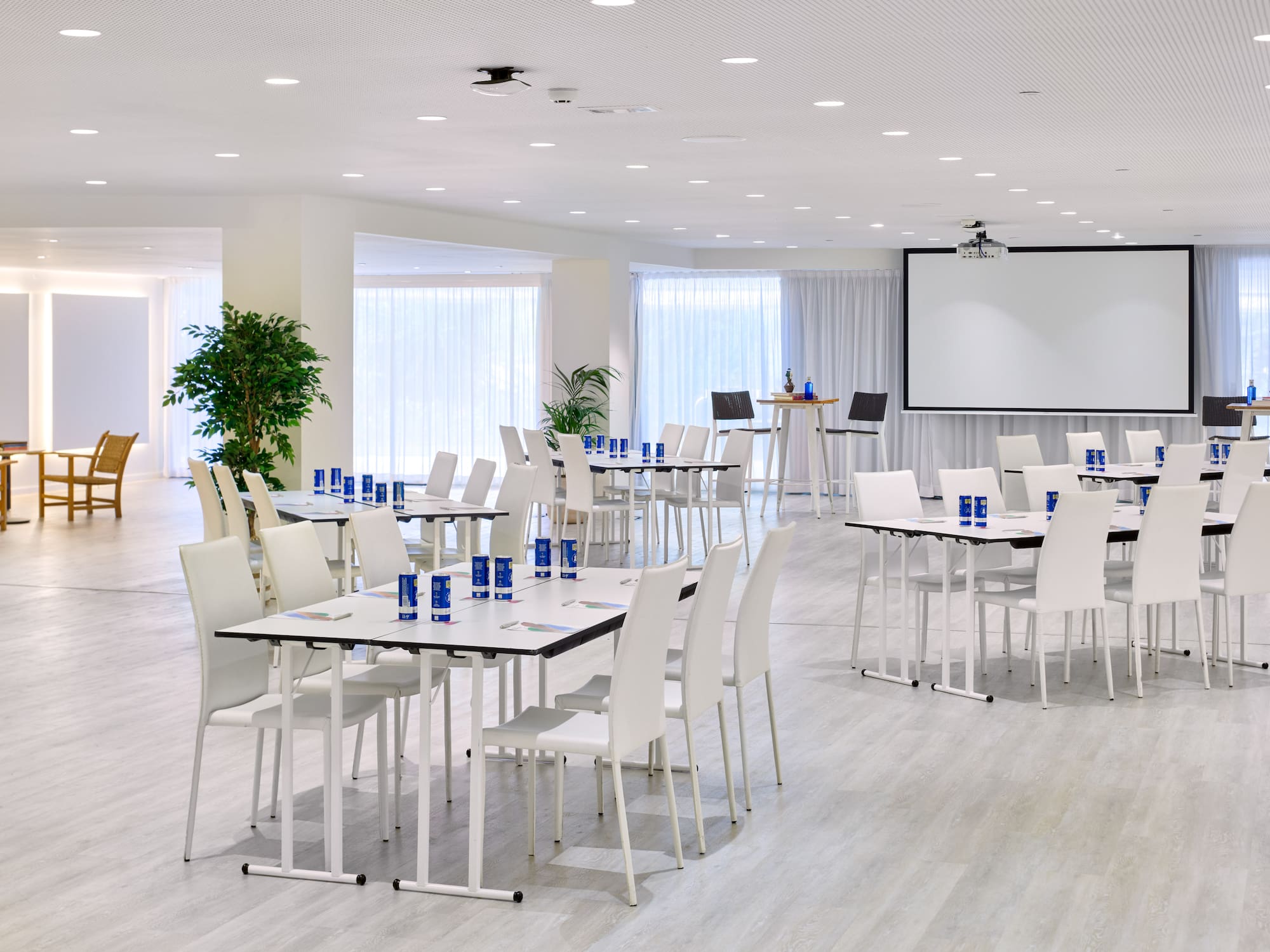 a room with tables and chairs