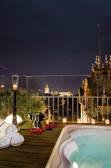 a hot tub and a hot tub on a balcony