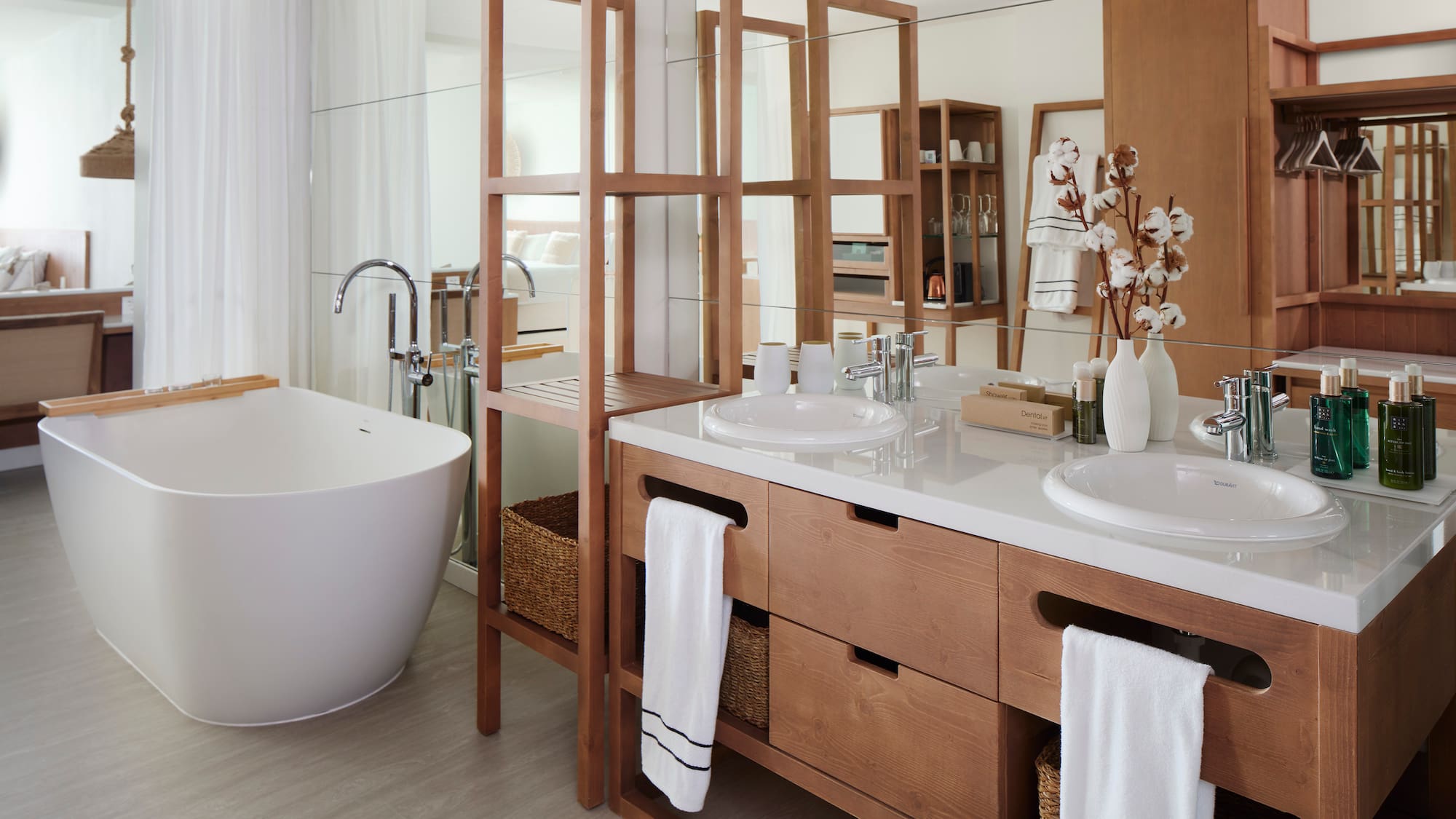 a bathroom with a tub and sink