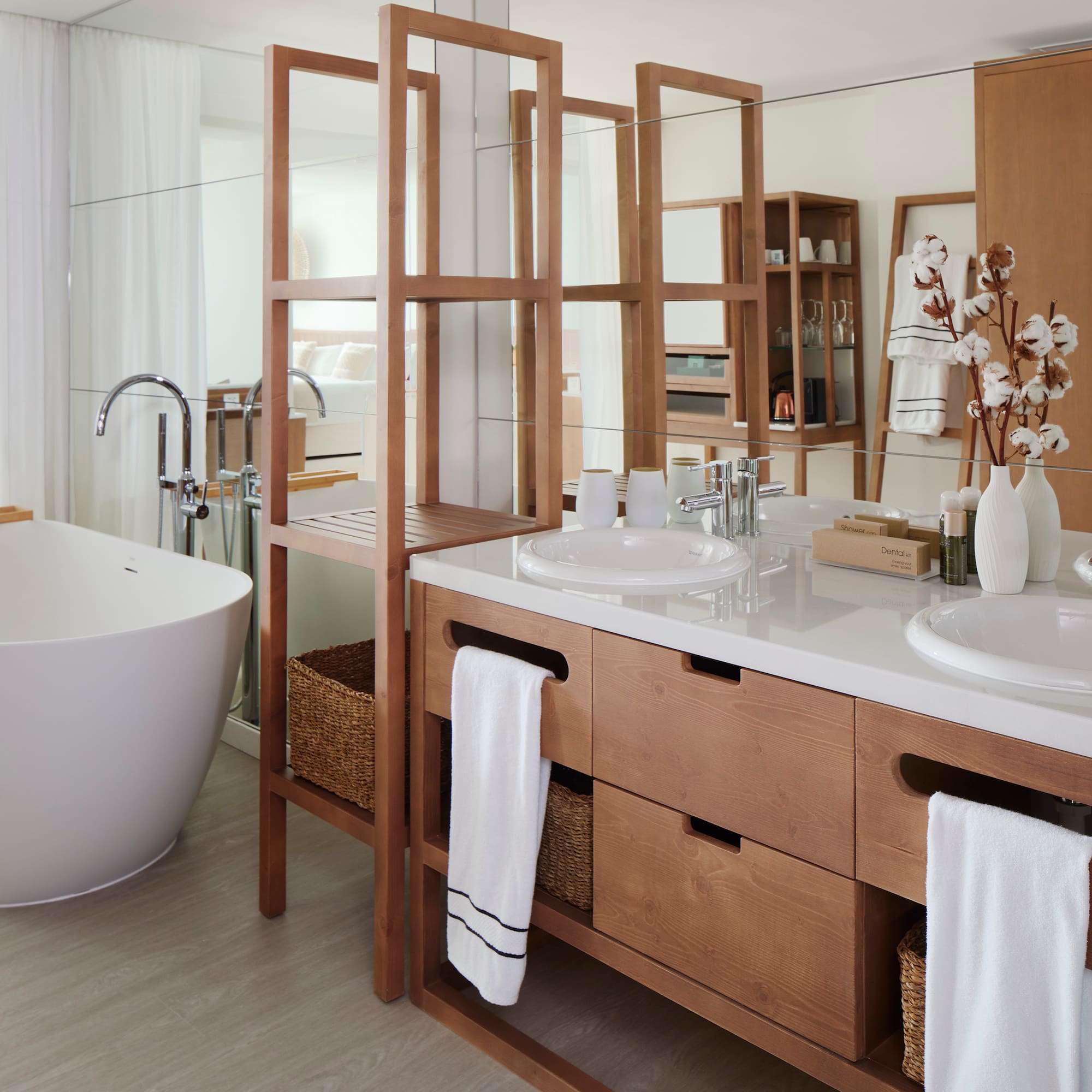 a bathroom with a tub and sink