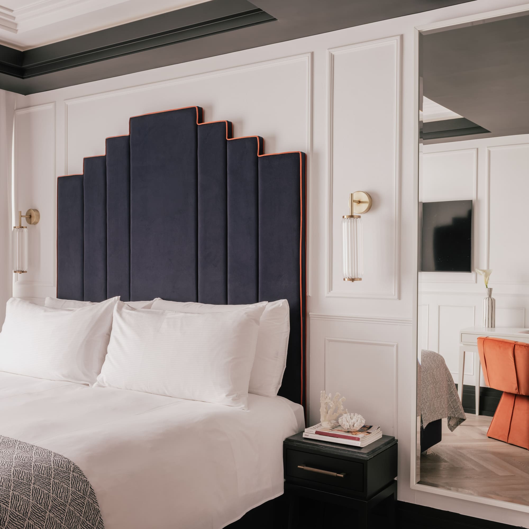 a room with a bed and a chair