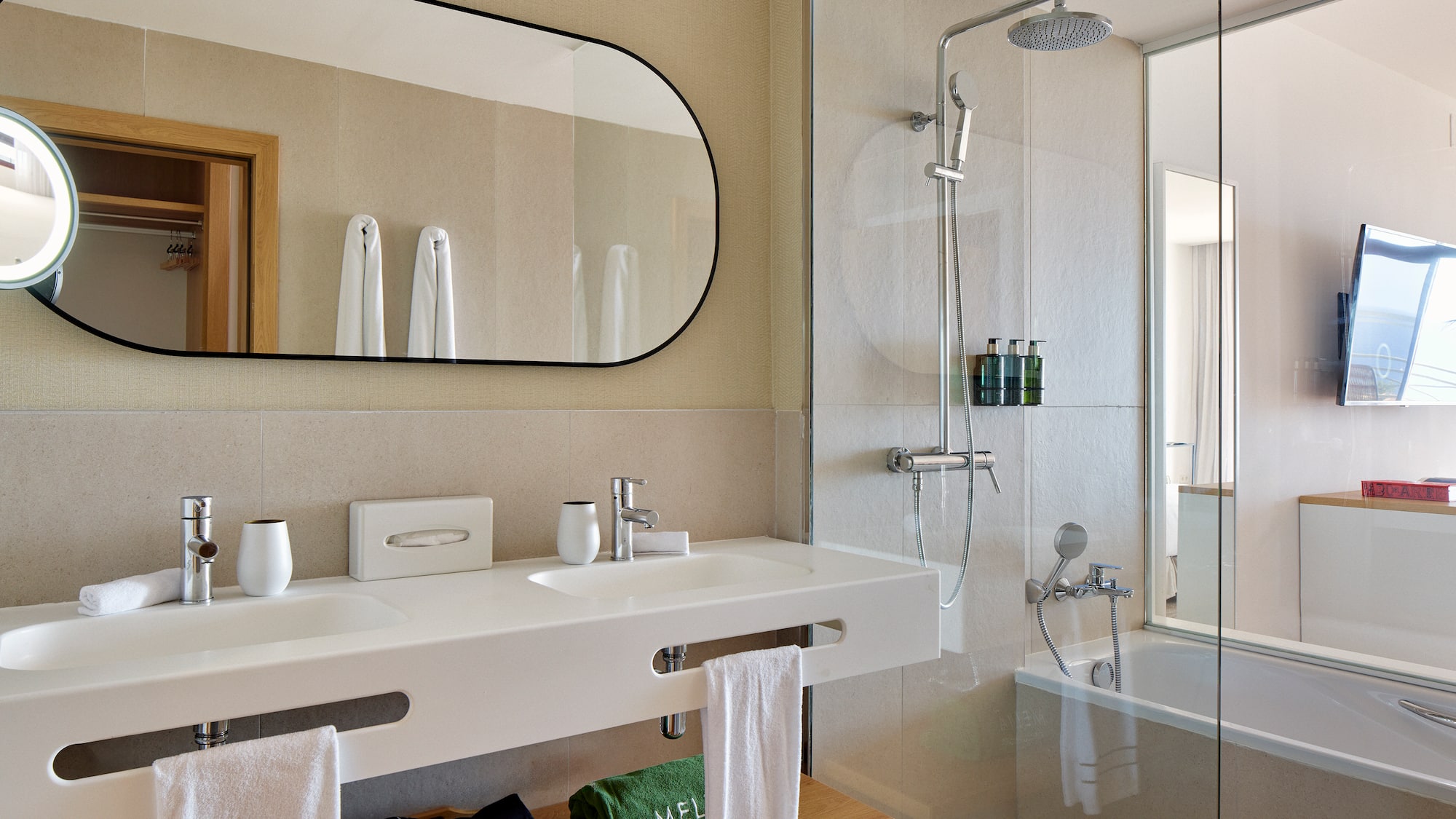 a bathroom with a shower and sink