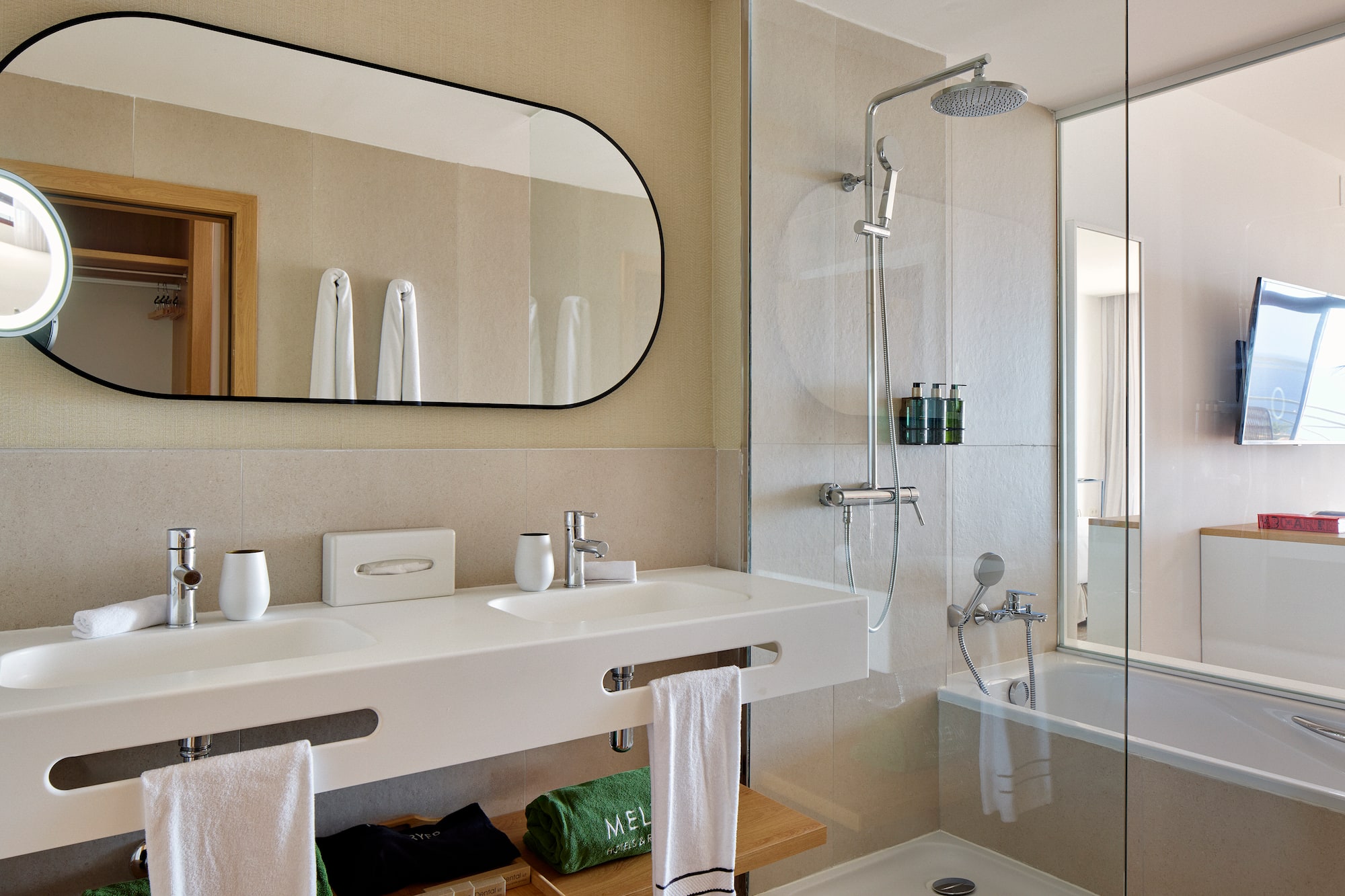a bathroom with a shower and sink