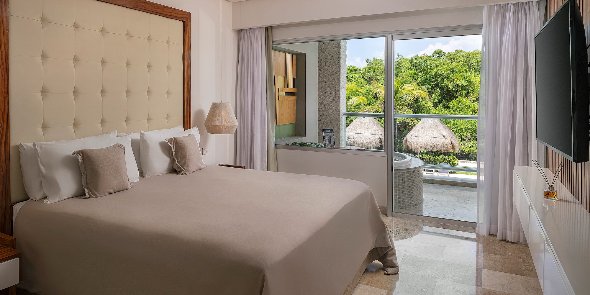 a bed with a glass door