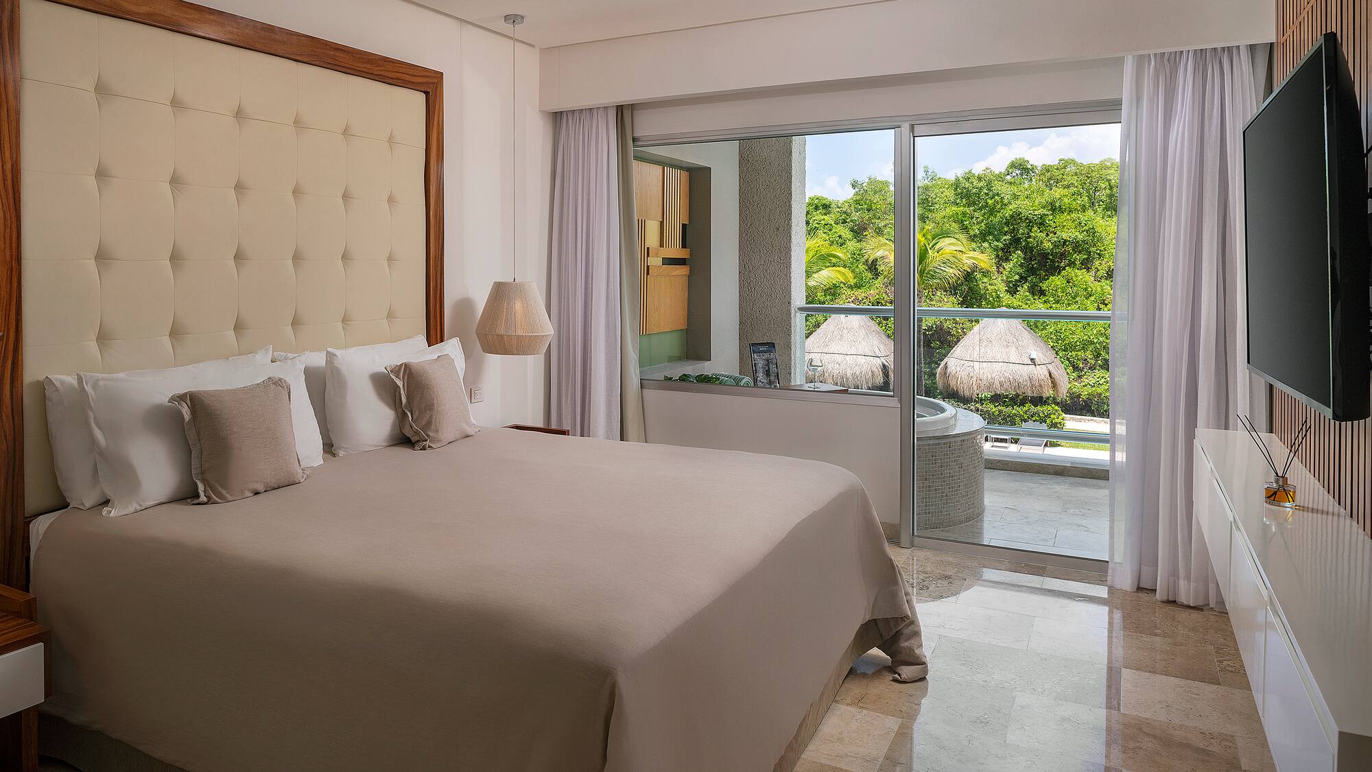 a bed with a glass door