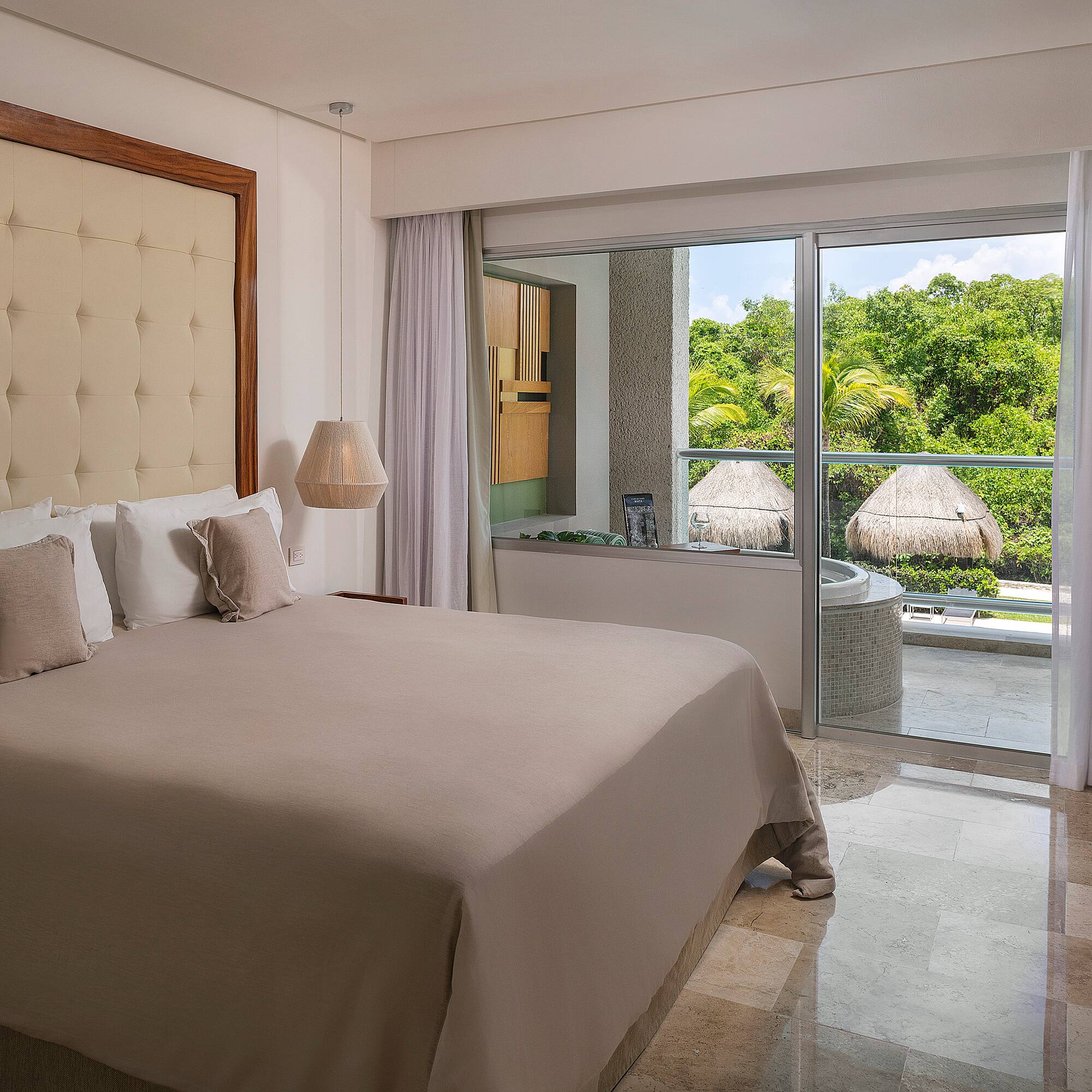 a bed with a glass door