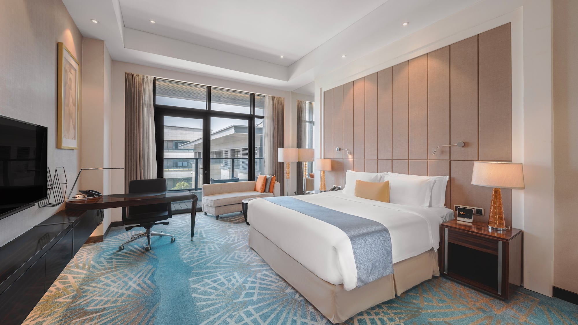 a room with a bed and a desk