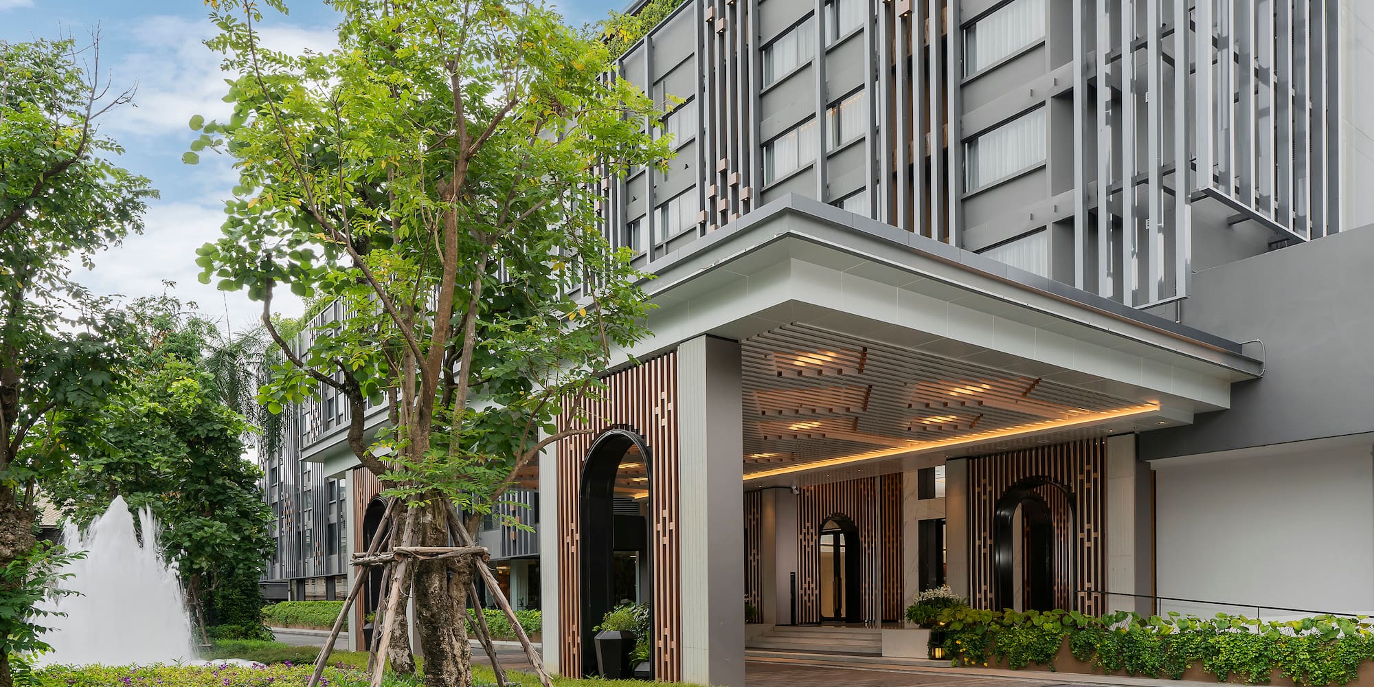 a building with a tree in front of it