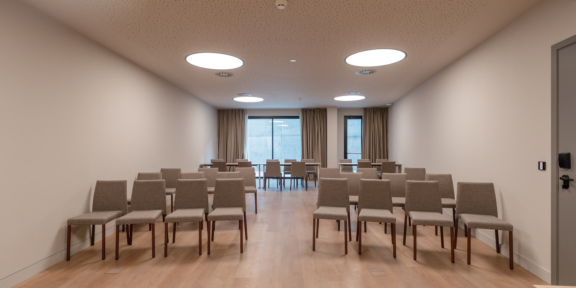 a room with chairs and tables