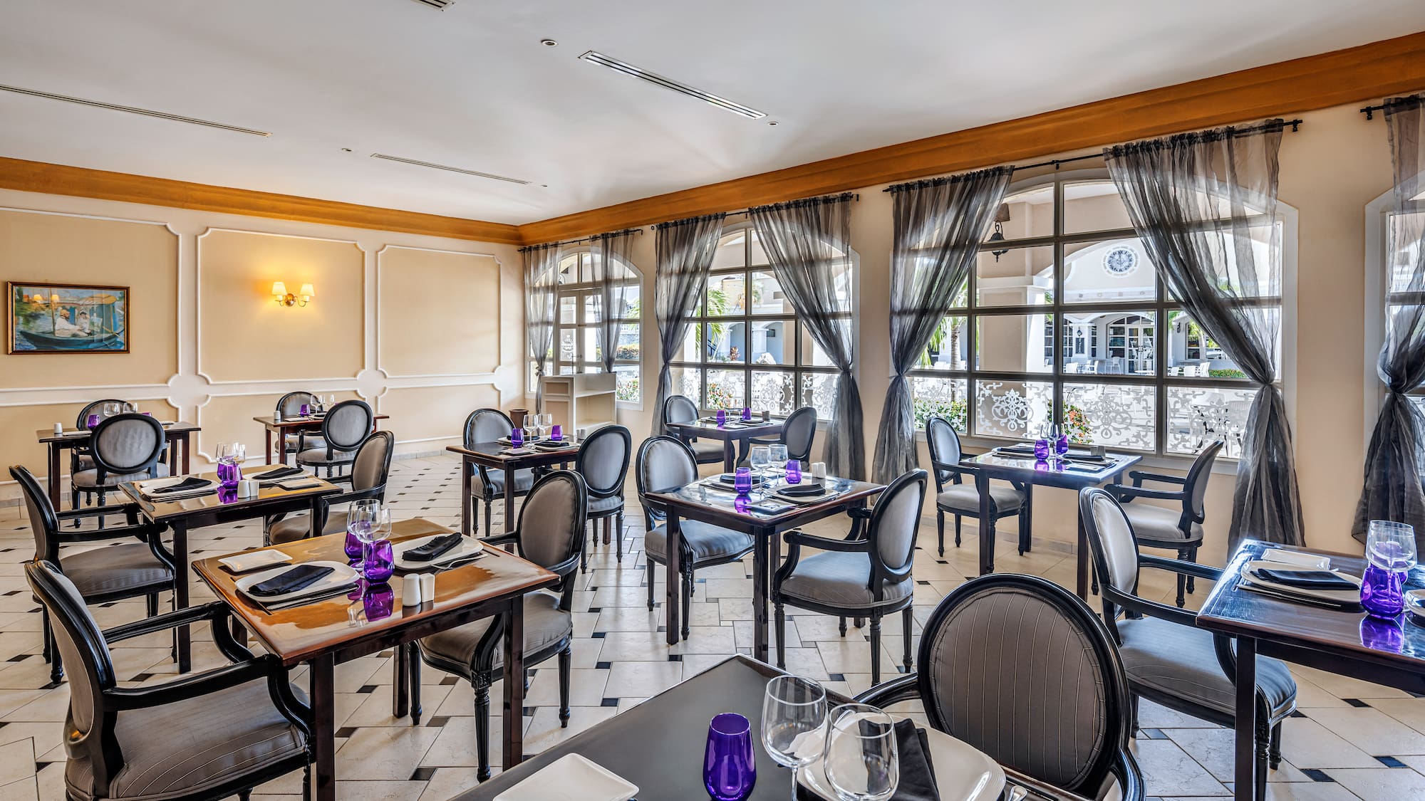 a room with tables and chairs