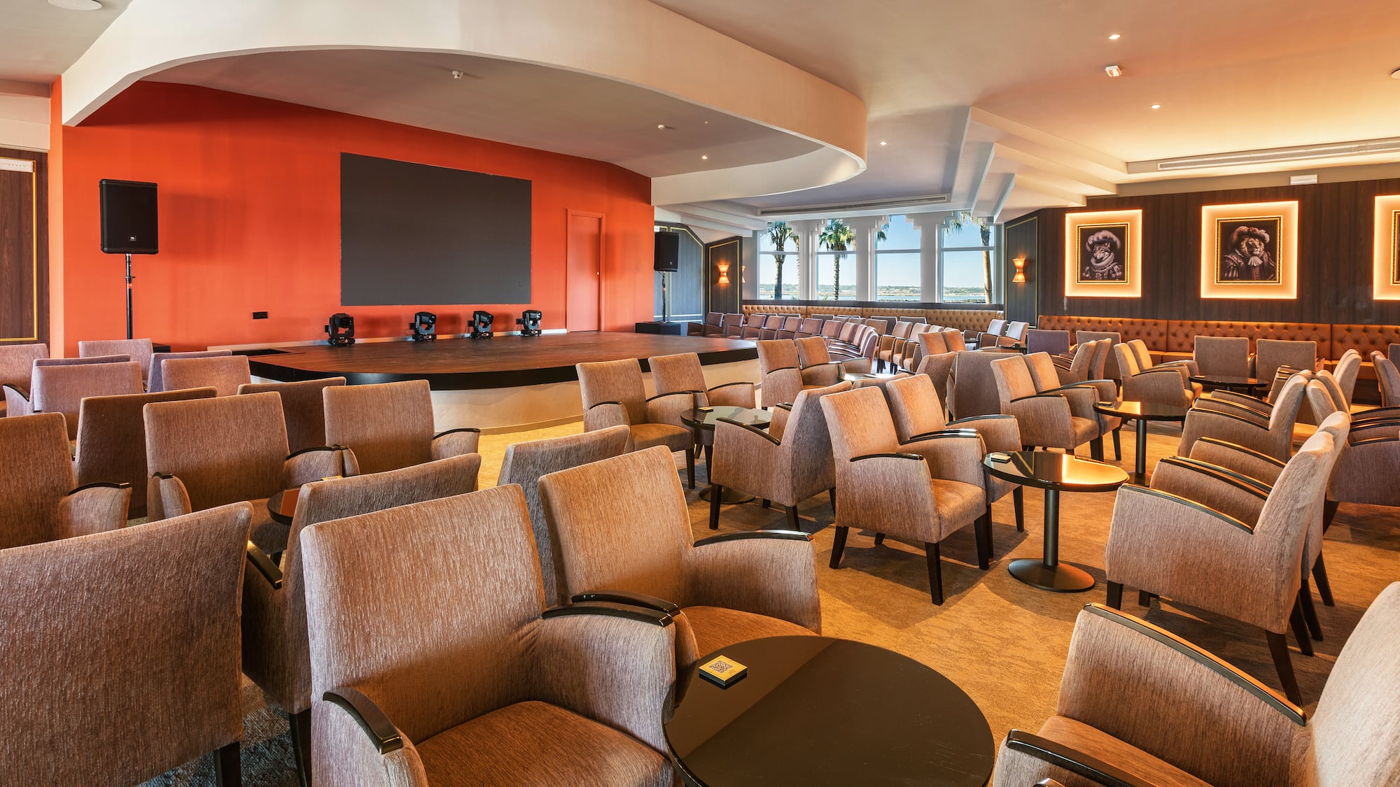 a room with chairs and tables