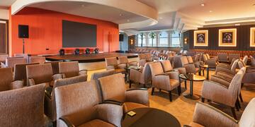 a room with chairs and tables