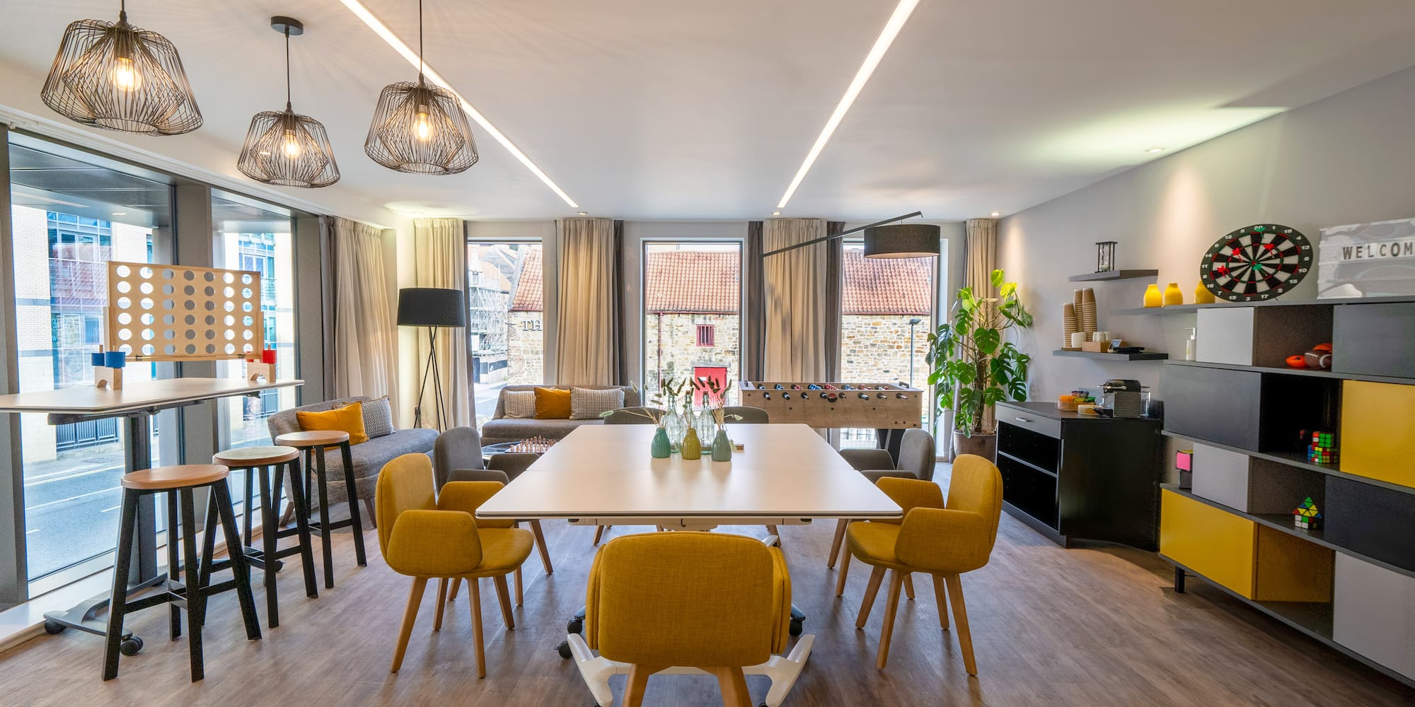 a room with a table and chairs